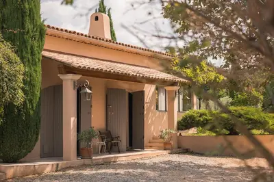 a small house with a turret on top of it at Magnifique Villa Provençale in Rognes
