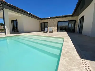 a swimming pool in the backyard of a house at Villa with pool in Provence bij de Mont Ventoux in Blauvac