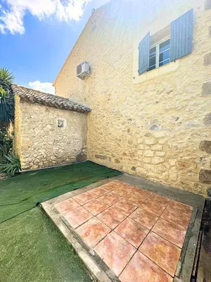 a brick building with a window on the side of it at Mas Bourbon in Cavaillon