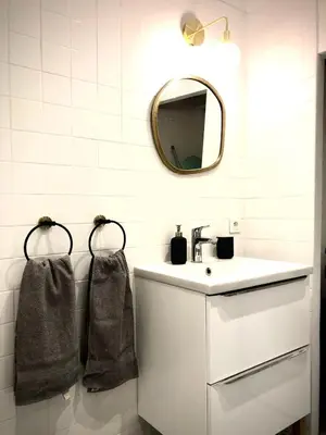 a bathroom with a sink and a mirror at Appart de charme CLIM 37m2 T1 Hôtel de ville in Aix-en-Provence