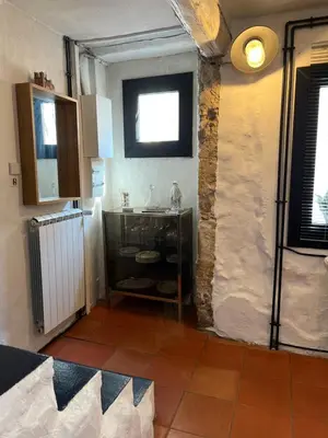 a kitchen that is being remodeled with a wall at Maison cosy en Provence Proche Golf Pont Royal in Alleins
