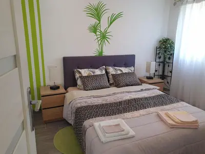 a bedroom with a bed with two towels on it at LS1-451 - Chambri in Orgon