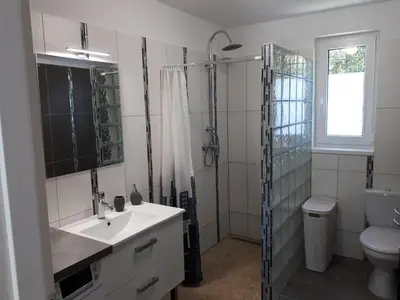 a bathroom with a sink and a shower and a toilet at LS1-451 - Chambri in Orgon