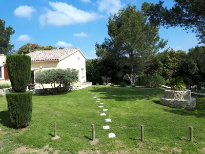 a garden with a path in front of a house at LS1-451 - Chambri in Orgon