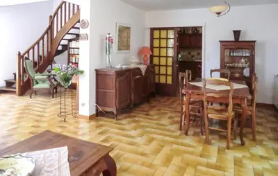 a living room with a table and a dining room at Amazing Home In Vedène in Vedène