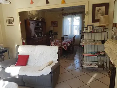 a living room with a couch and a table at Mas augustin in Saint-Rémy-de-Provence