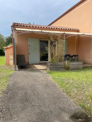 a screened in porch of a house at Maison aux Demeures du Ventoux Adaptée PMR in Aubignan