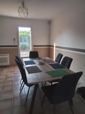 a dining room with a table and chairs at Ventoux beautiful quiet house in Saint-Christol