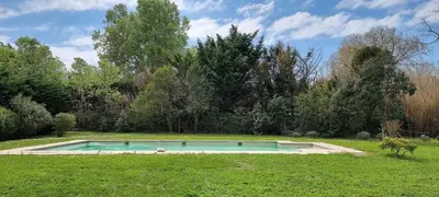 a swimming pool in the middle of a yard at Charming house Saint Remy de Provence in Saint-Rémy-de-Provence