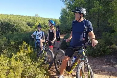 a group of people riding bikes on a trail at Studio cosy, résidence de tourisme avec piscine in Aix-en-Provence
