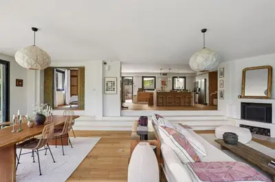 a living room with a couch and a table at Big Modern Villa Ste Victoire 10min CityCenter Aix in Saint-Marc-Jaumegarde