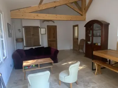 a living room with a couch and a table at Villa Augustine in Ventabren