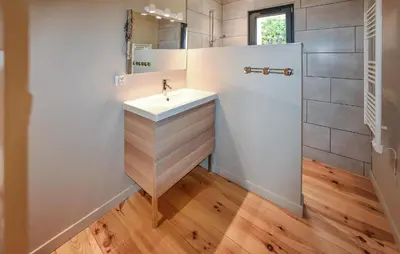 a bathroom with a sink and a mirror at Baumann 1 in Bédoin