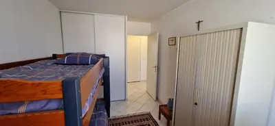 a bedroom with a bed and a closet at Le Belvédère, Air Conditioning, Freepark 6p in Aix-en-Provence