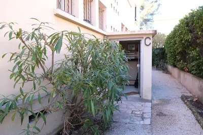 a small tree in front of a building at Three bedrooms apartment in Aix en Pce in Aix-en-Provence
