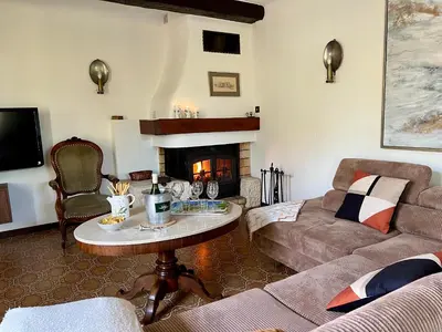 a black dining table and chairs on a patio at Escapade entre amis en Provence, 4 chambres, terrasse & jardin, proche Avignon in Caumont-sur-Durance