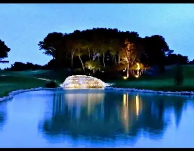 a large body of water with trees in the background at Superbe appartement dans golf 4 étoiles in Saumane-de-Vaucluse