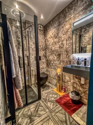 a bathroom with a shower and a sink at Suite d'exception, luxe, élégance et raffinement in Aix-en-Provence