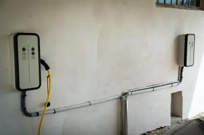 a wall with a hose hooked up to a wall at La Maison PP - Appartements in Carpentras