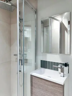 a bathroom with a sink and a shower at New! Le zola studio lumineux en centre ville in Aix-en-Provence