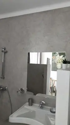 a bathroom with a sink and a mirror at Escale vélo La petite Reine in Cavaillon
