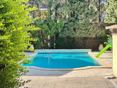 a small swimming pool in a yard with trees at Bourgeois House - 16 personnes, Piscine, 6 chambres, 8 lits, 4 SDB, Centre-ville, CLIM in Salon-de-Provence
