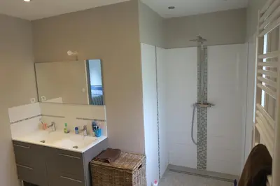 a bathroom with a sink and a shower at L'embellie in Châteaurenard