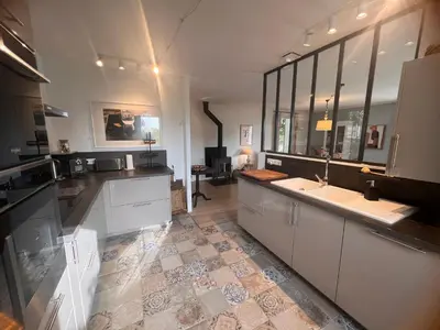 a kitchen with a sink and a counter top at Haus PETIT REVE in Oppède in Oppède
