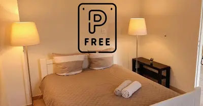 a bedroom with a bed with two towels on it at Provence apartments in Aix-en-Provence