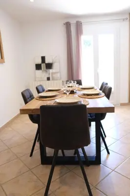a dining room table with chairs around it at Villa overlooking the Alpilles Saint Remy de Provence LS1-454 in Saint-Rémy-de-Provence