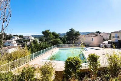 a view of a swimming pool in a villa at Les Coteaux de Pont Royal en Provence - maeva Home - Maison 3 pièces 6 personnes - Sélection MAE-9993 in Mallemort