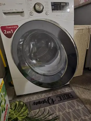 a washing machine with its door open in a store at 3 Bedroom House Terrace Park & Free Parking in Aix-en-Provence