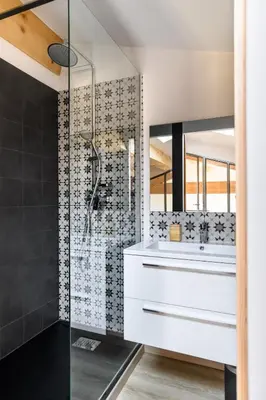 a bathroom with a shower and a white sink at Loft en Provence - Terrasse-Climatisation-Proche Golf et Luberon in Vernègues