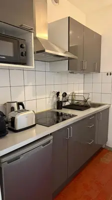 a kitchen with a sink and a counter top at Studio dans le centre ancien in Carpentras