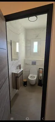 a bathroom with a toilet and a sink at Maison de campagne in Salon-de-Provence