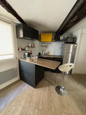 a kitchen with a wooden counter top in a room at inactive in Aix-en-Provence