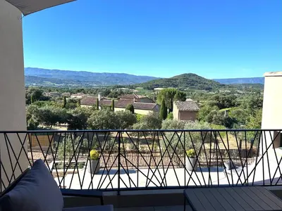 a view from the balcony of a house at Keur Bouyo - Provençal Luxury Retreat in Saint-Saturnin-les-Apt