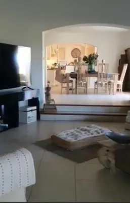 a living room with a dog laying on the floor at beautiful 4 bedroom villa, pool, Luberon in Cadenet