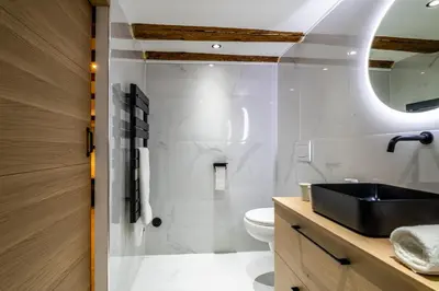 a bathroom with a sink and a toilet at Studio cosy I Centre historique in Cavaillon