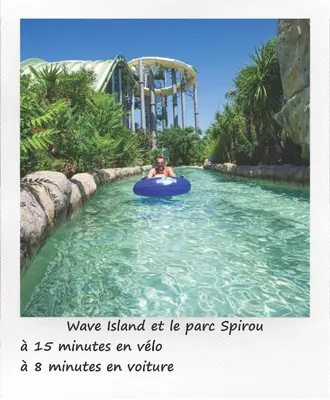 a woman riding a pedal boat on the water at Petit studio avec jardin à 10 mn d'Avignon in Entraigues-sur-la-Sorgue