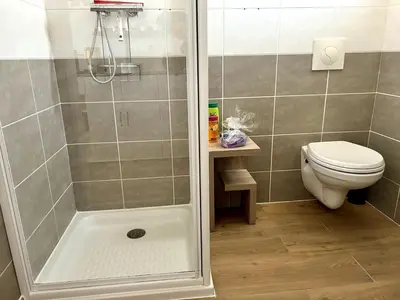 a bathroom with a shower and a toilet at Ma place au sud 216 in Éguilles