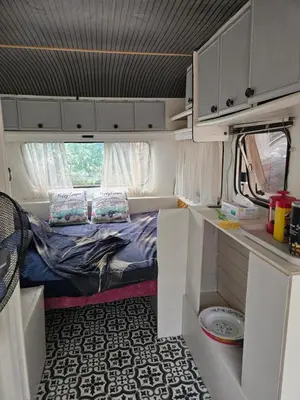 a small room with a bed in an rv at Escapade en caravane près d'aix en provence in Meyreuil
