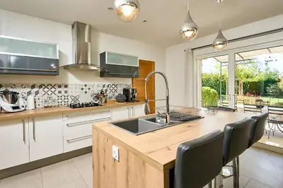 a kitchen with a sink and a counter top at Maison au calme proche Mont Ventoux et Luberon in Malemort-du-Comtat