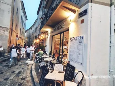 a group of tables and chairs outside of a restaurant at Studio plein centre Aix-en-Provence in Aix-en-Provence