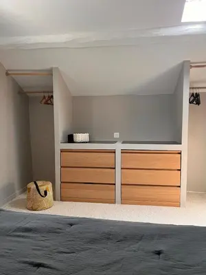 a bedroom with wooden cabinets and a bed in it at Maison 2 ch en campagne 5 mn du centre en voiture avec possibilité piscine familiale in Salon-de-Provence