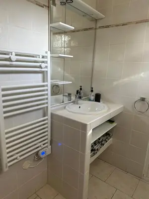 a room with a closet with wooden shelves at Aix Villa Theolina in Aix-en-Provence