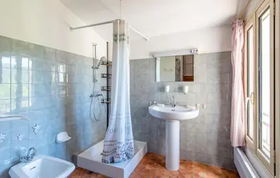 a bathroom with a shower and a sink and a toilet at 3 Bedroom Stunning Home In Saignon in Saignon