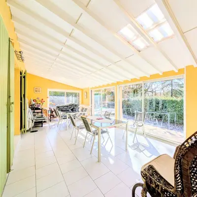 a living room with couches and a table at L'Oliveraie - Maison Familiale avec Piscine privée - Clim - Wifi - 4 Chambres - 3 Salle de Bains in Jouques