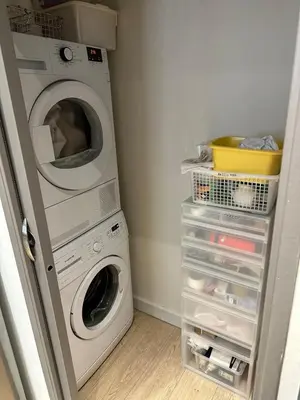 a laundry room with a washer and a washer at Aix flat in historic center, 17th century building in Aix-en-Provence