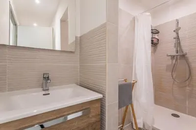 a bathroom with a sink and a shower at Central studio, perfect for discovering Aix on foot in Aix-en-Provence